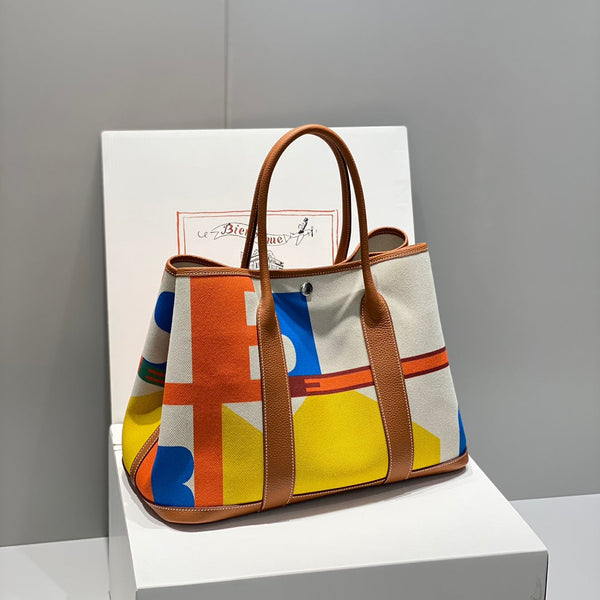 HERMES GARDEN PARTY 36 IN VIBRANT TOILE H CANVAS GOLD CALFSKIN